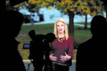 Counselor to President Donald Trump Kellyanne Conway, is interviewed on television at the White House's North Lawn in Washington, Wednesday, Nov. 7, 2018. (AP Photo/Manuel Balce Ceneta)