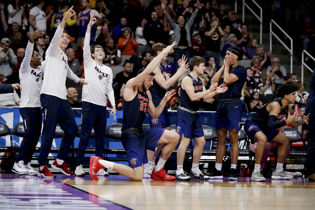 Liberty celebrates during the second half of a first round game against Mississippi State in the NCAA men's college basketball tournament Friday, March 22, 2019, in San Jose, Calif. (AP Photo/Ben ...