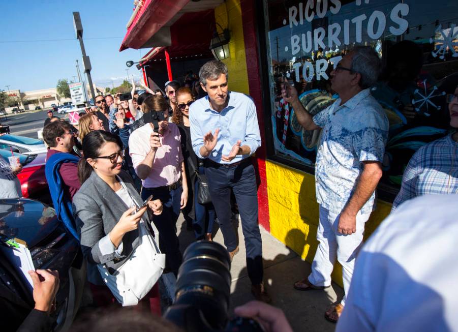 Democratic presidential candidate and former Texas congressman Beto O'Rourke greets supporters during a campaign stop at Arandas Taqueria in Las Vegas on Sunday, March 24, 2019. (Chase Stevens/Las ...