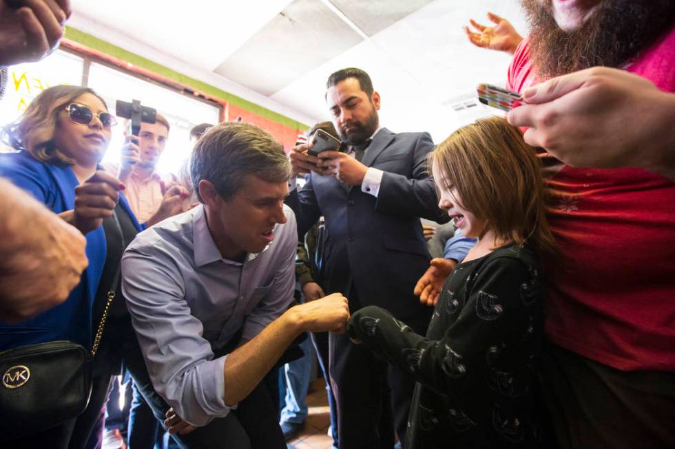 Democratic presidential candidate and former Texas congressman Beto O'Rourke greets a supporter during a campaign stop at Arandas Taqueria in Las Vegas on Sunday, March 24, 2019. (Chase Stevens/La ...