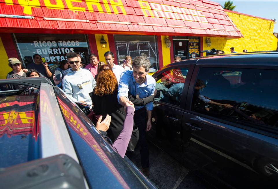 Democratic presidential candidate and former Texas congressman Beto O'Rourke greets supporters during a campaign stop at Arandas Taqueria in Las Vegas on Sunday, March 24, 2019. (Chase Stevens/Las ...