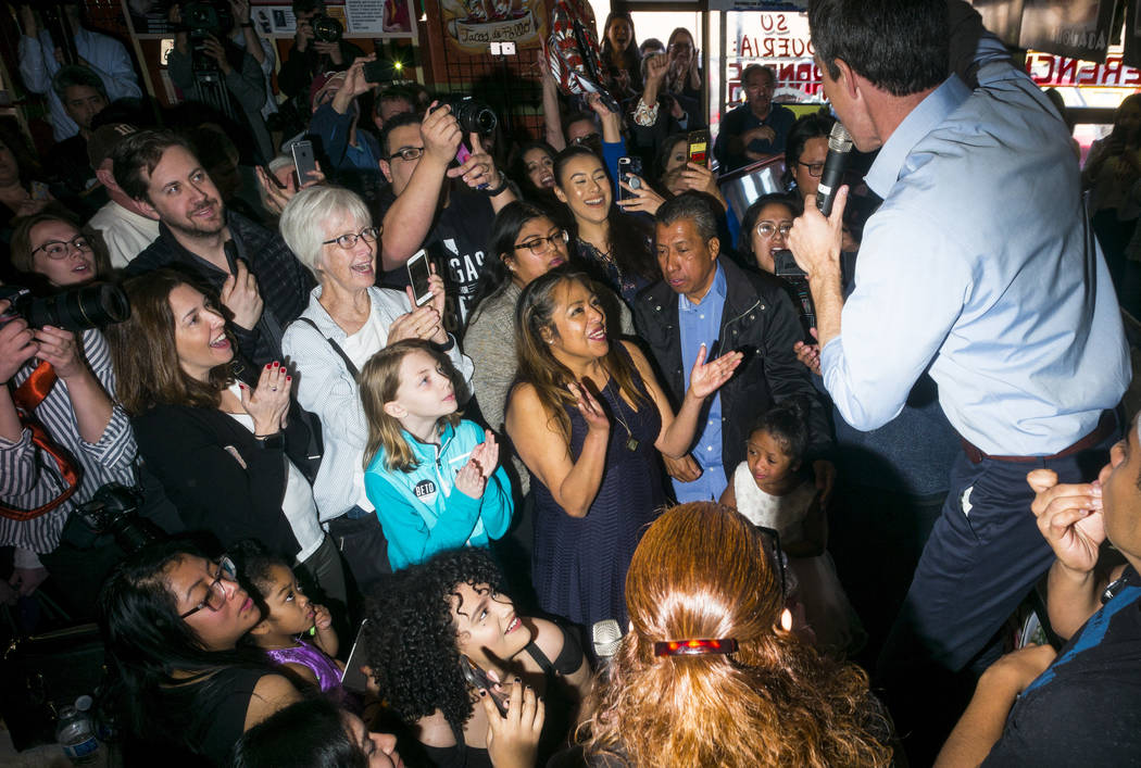 Democratic presidential candidate and former Texas congressman Beto O'Rourke, right, speaks during a campaign stop at Arandas Taqueria in Las Vegas on Sunday, March 24, 2019. (Chase Stevens/Las Ve ...