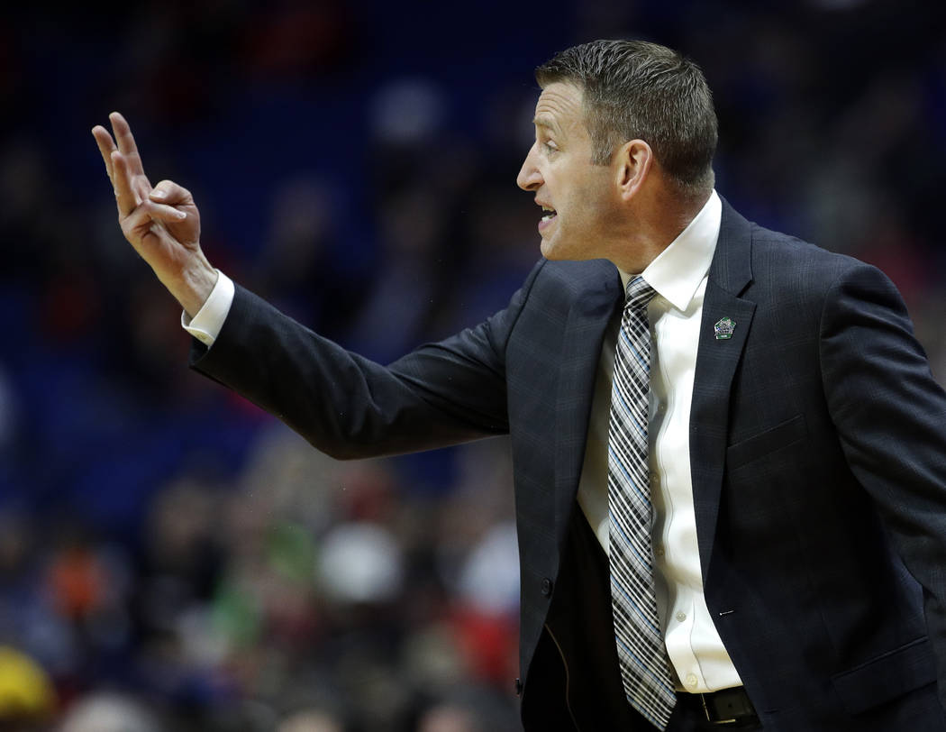 Buffalo head coach Nate Oats talks to his players during the first half of a first round men's college basketball game against Arizona State in the NCAA Tournament Friday, March 22, 2019, in Tulsa ...