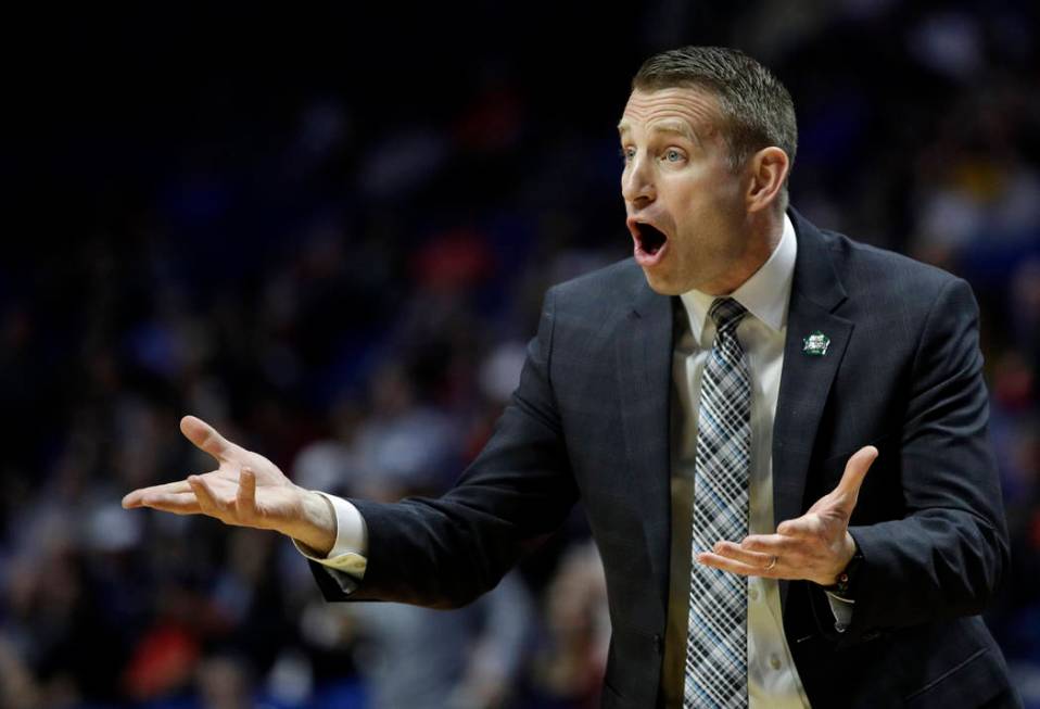 Buffalo head coach Nate Oats talks to his players during the first half of a first round men's college basketball game against Arizona State in the NCAA Tournament Friday, March 22, 2019, in Tulsa ...