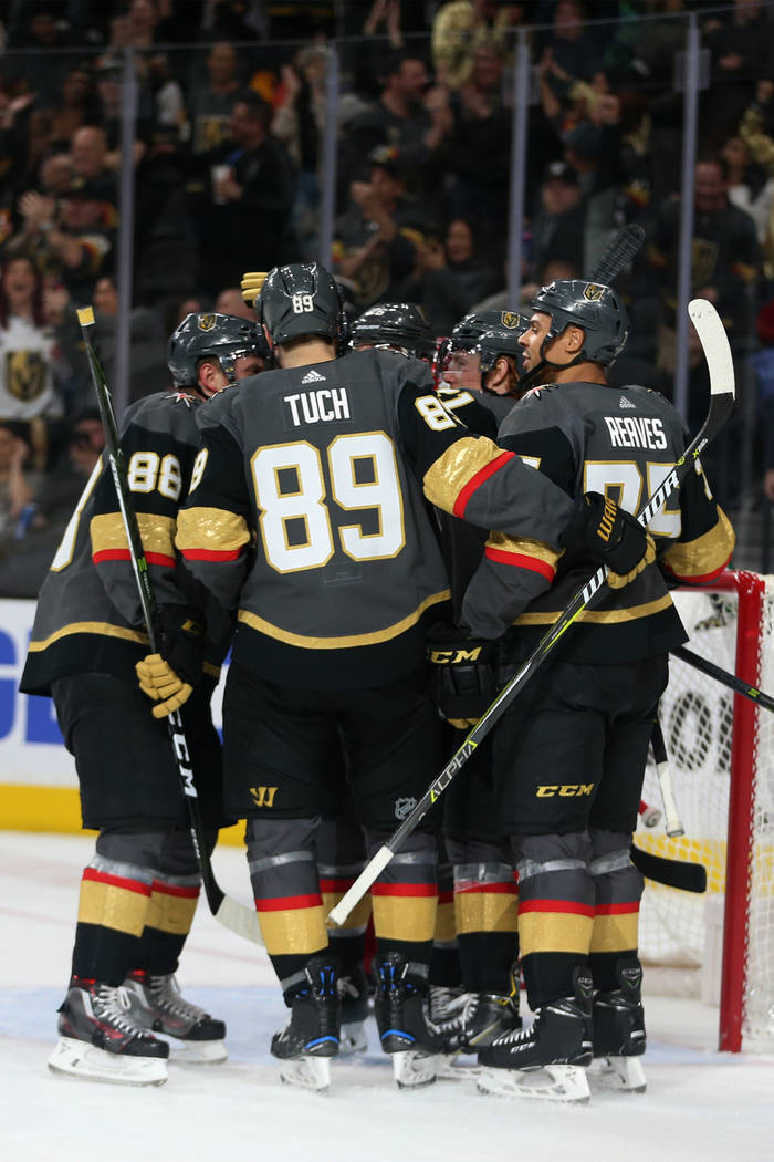 Vegas Golden Knights celebrate a score by center Cody Eakin (21) during the second period of an NHL hockey game at T-Mobile Arena in Las Vegas, Saturday, March 23, 2019. Erik Verduzco Las Vegas Re ...