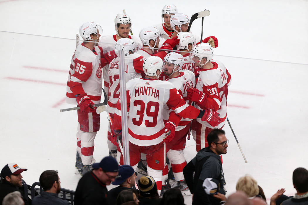 Detroit Red Wings right wing Anthony Mantha (39) celebrates his winning score with his team during overtime of an NHL hockey game at T-Mobile Arena in Las Vegas, Saturday, March 23, 2019. Detroit ...
