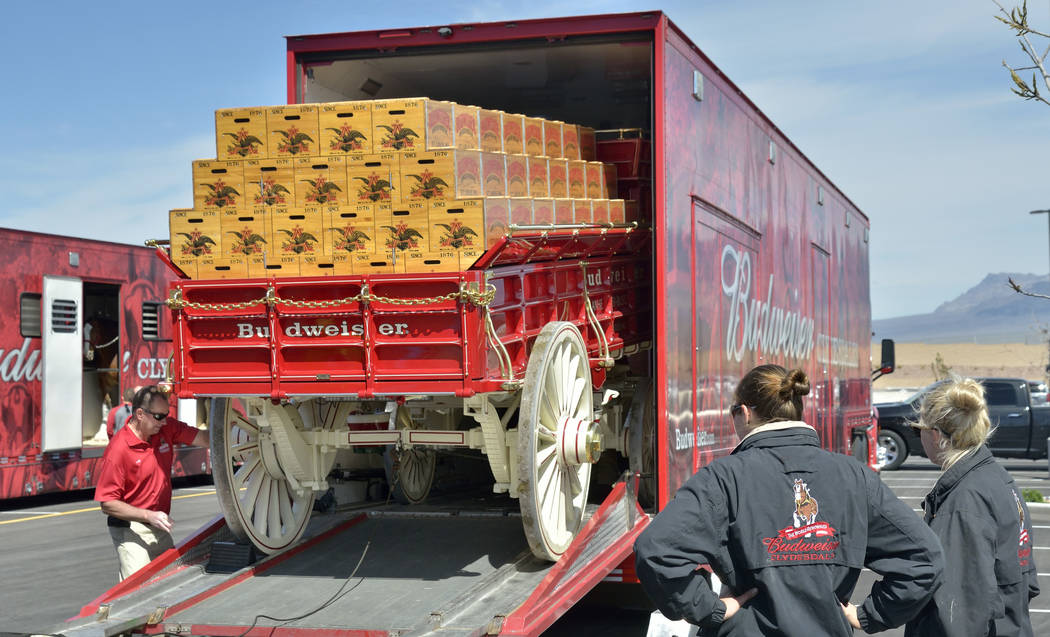 The beer wagon is unloaded from a semi-trailer during a visit by the Budweiser Clydesdales to the Smith’s Marketplace at 9710 W. Skye Canyon Park Drive in Las Vegas on Saturday, March 23, 2 ...