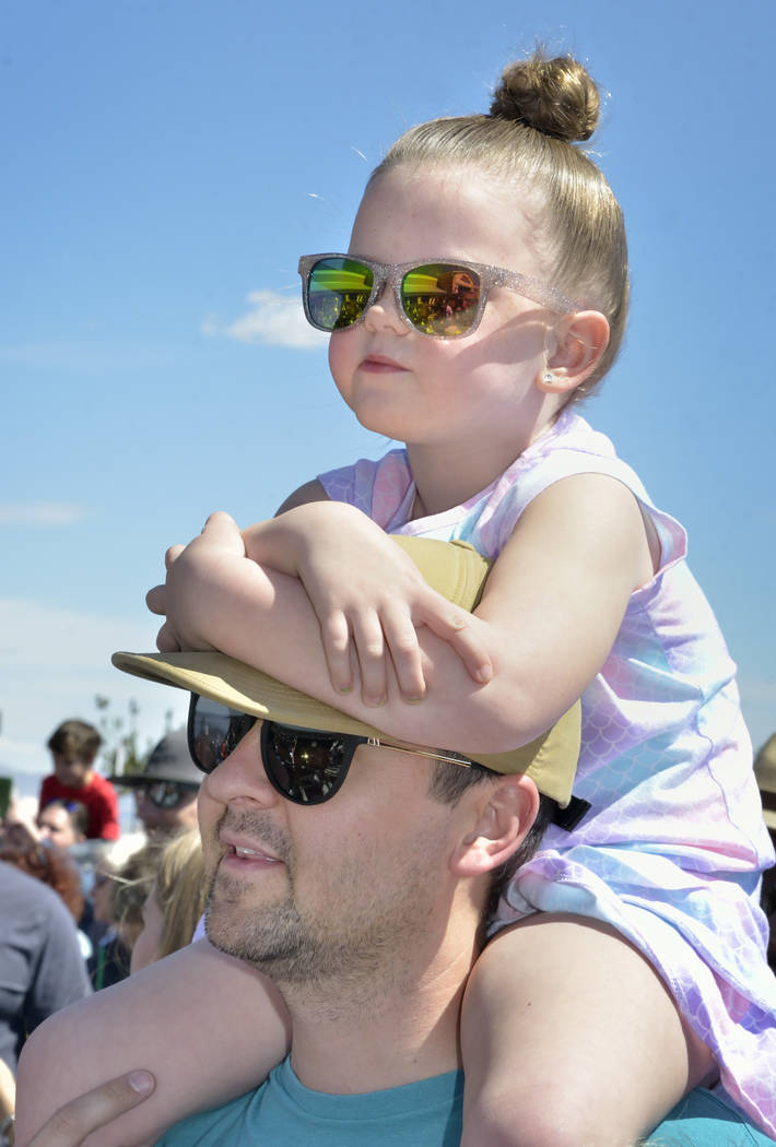 Piper Christensen, 5, watches with her father Stewart during a visit by the Budweiser Clydesdales to the Smith’s Marketplace at 9710 W. Skye Canyon Park Drive in Las Vegas on Saturday, Marc ...