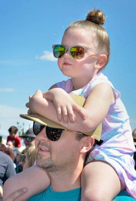 Piper Christensen, 5, watches with her father Stewart during a visit by the Budweiser Clydesdales to the Smith’s Marketplace at 9710 W. Skye Canyon Park Drive in Las Vegas on Saturday, Marc ...