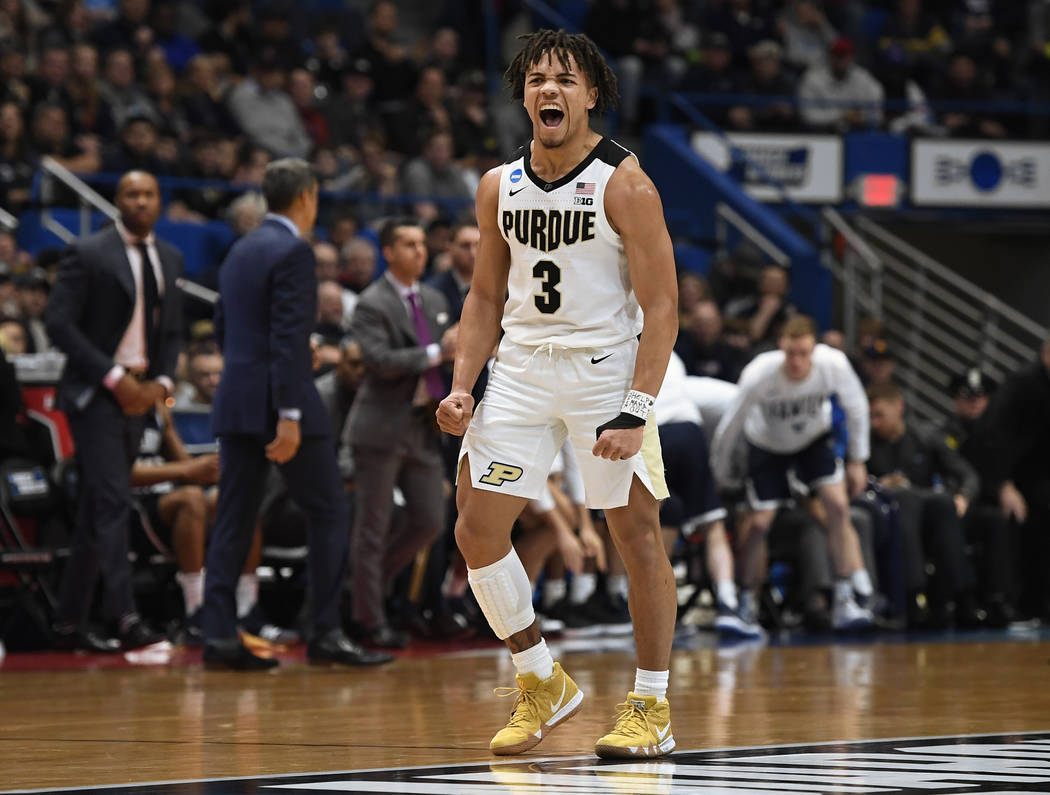 Purdue's Carsen Edwards (3) reacts during the first half of a second-round men's college basketball game against Villanova in the NCAA tournament, Saturday, March 23, 2019, in Hartford, Conn. (AP ...