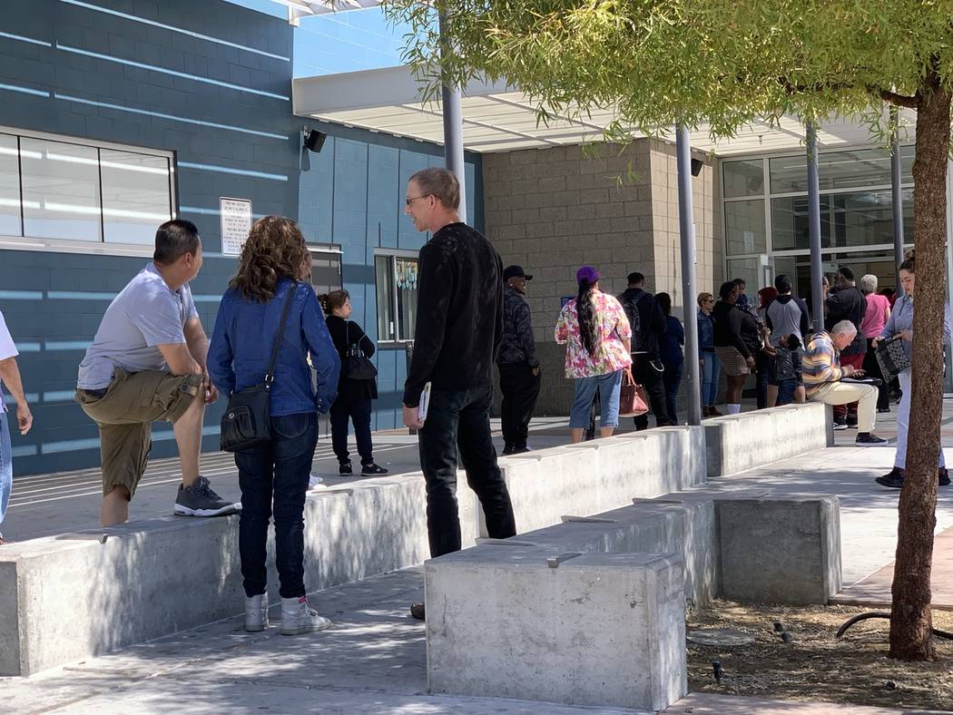 Customers line up outside the Department of Motor Vehicle office on Sahara Avenue Monday, the day a new appointment system was rolled out.