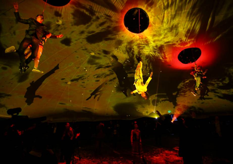 Cast members in "Fuerza Bruta" perform as part of a media preview at the show's tent outside of the Excalibur in Las Vegas on Wednesday, March 6, 2019. The show, which takes place inside ...