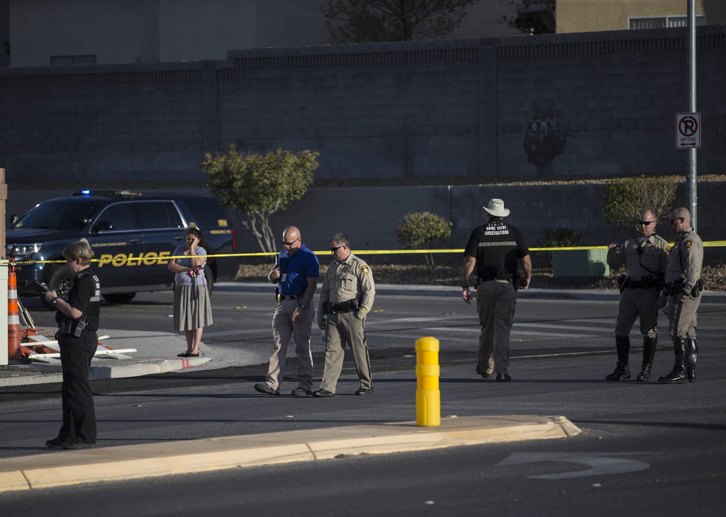 Law enforcement investigate a car accident at South Fort Apache Road and West Arby Avenue that left one minor dead and one hospitalized on Monday, March 25, 2019, in Las Vegas. (Benjamin Hager Rev ...