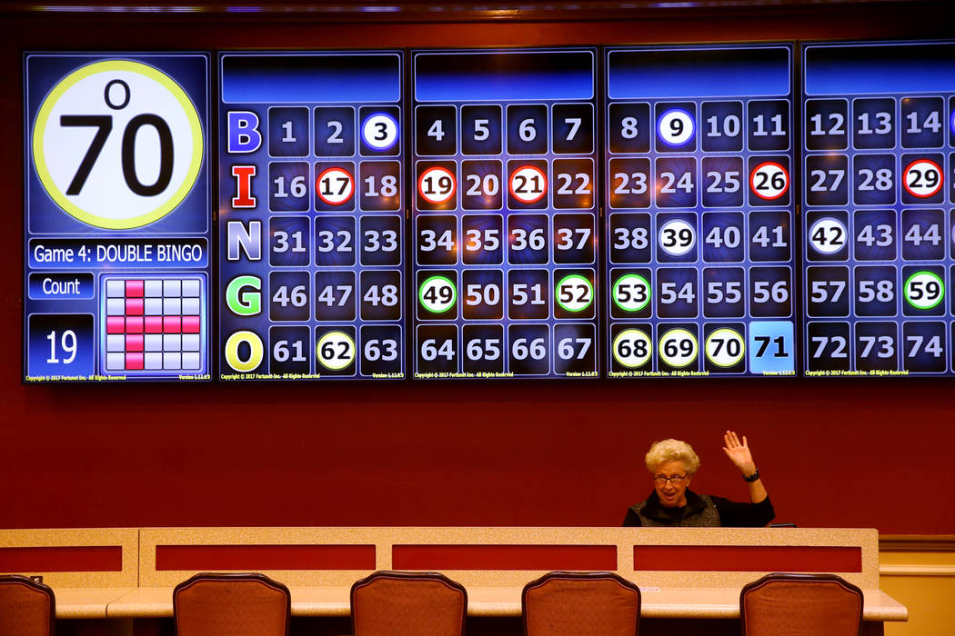 Dorothy Henrichsen, of Henderson, who has been a customer for 29 years, gets a bingo during the ...