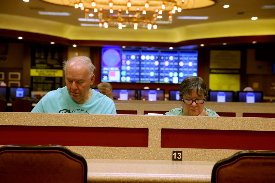 Gregory and Maureen Lemanski, of Toms River, New Jersey, play in the first bingo session of the ...