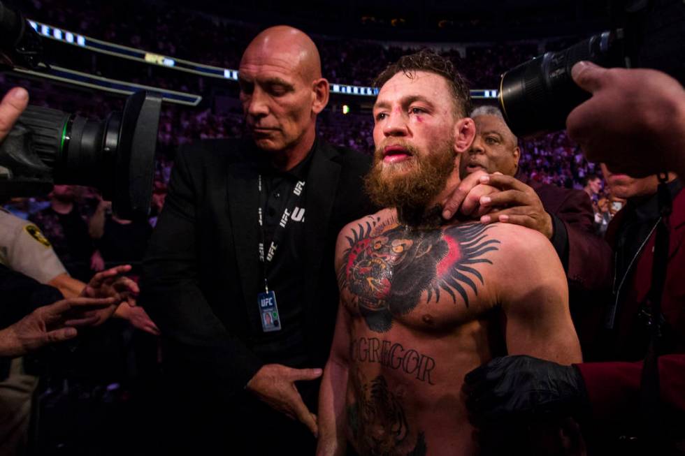 Conor McGregor leaves the octagon after his loss to Khabib Nurmagomedov in their lightweight title bout at UFC 229 at T-Mobile Arena in Las Vegas on Saturday, Oct. 6, 2018. Chase Stevens Las Vegas ...