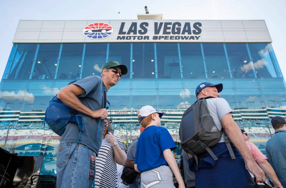 Attendees walk on pit row before the start of the Monster Energy NASCAR Cup Series Pennzoil 400 on Sunday, March 3, 2019, at Las Vegas Motor Speedway, in Las Vegas. (Benjamin Hager Review-Journal) ...