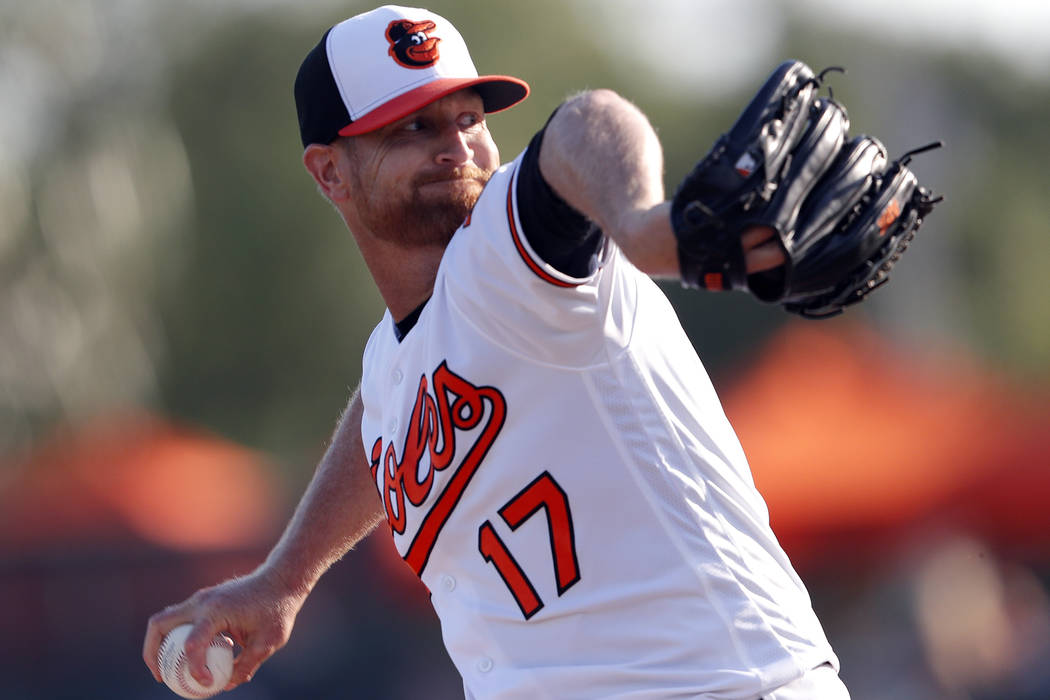 Baltimore Orioles starting pitcher Alex Cobb (17) works Minnesota Twins in the first inning of a spring training baseball game Saturday, March 23, 2019, in Sarasota, Fla. (AP Photo/John Bazemore)