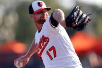 Baltimore Orioles starting pitcher Alex Cobb (17) works Minnesota Twins in the first inning of a spring training baseball game Saturday, March 23, 2019, in Sarasota, Fla. (AP Photo/John Bazemore)