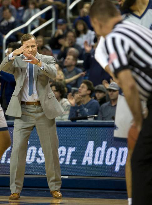 South Dakota State State head coach T.J. Otzelberger calls for a timeout in the second half of ...