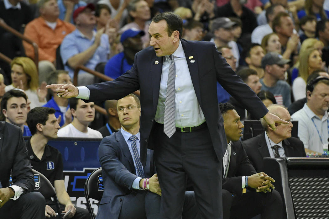 Duke coach Mike Krzyzewski gestures during the first half of a second round men's college basketball game against Central Florida in the NCAA Tournament in Columbia, S.C. Sunday, March 24, 2019. ( ...