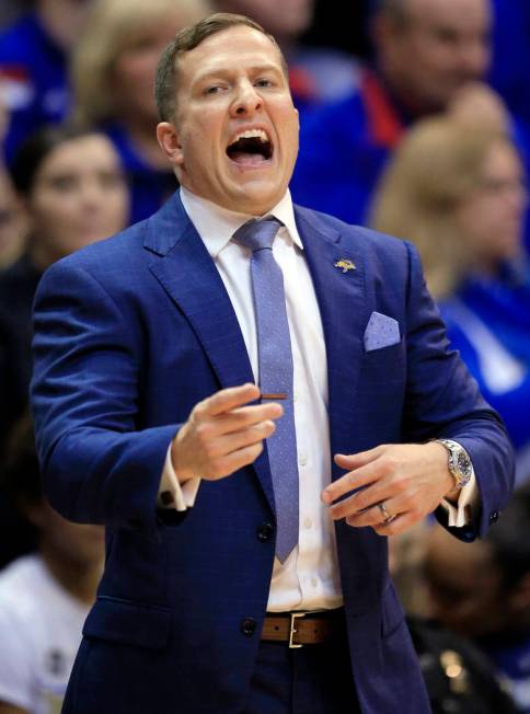 South Dakota State coach T.J. Otzelberger shouts to his team during the first half of an NCAA c ...