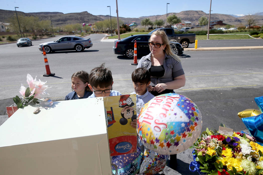 Dawn Yoshimori and three of her five children, from left, Evelyn, 7, Talan, 11, and Leo, 9, vis ...