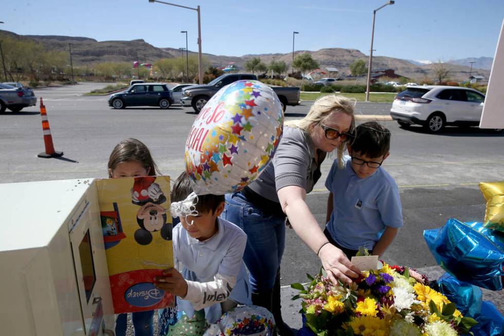 Dawn Yoshimori and three of her five children, from left, Evelyn, 7, Leo, 9, and Talan, 11, vis ...