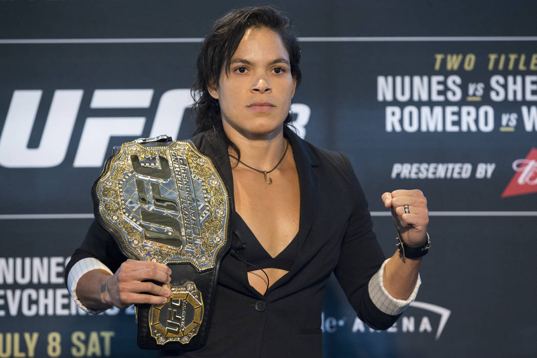 In this July 6, 2017, file photo, Amanda Nunes poses during media day for UFC 213 in Las Vegas. ...
