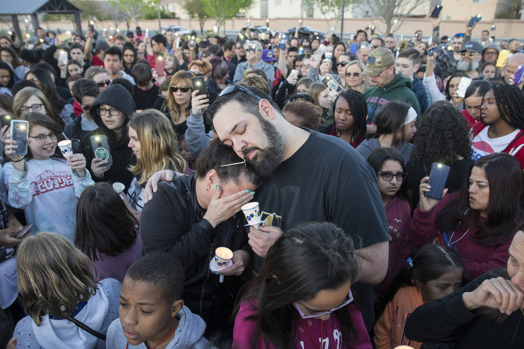 Friends and family mourn the loss of Jonathan Smith, 12, during a vigil for Smith at Wilbur &am ...