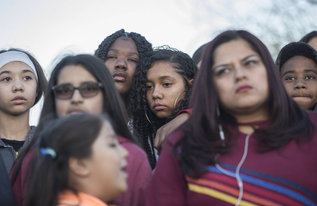 Friends and family mourn the loss of Jonathan Smith, 12, during a vigil for Smith at Wilbur &am ...