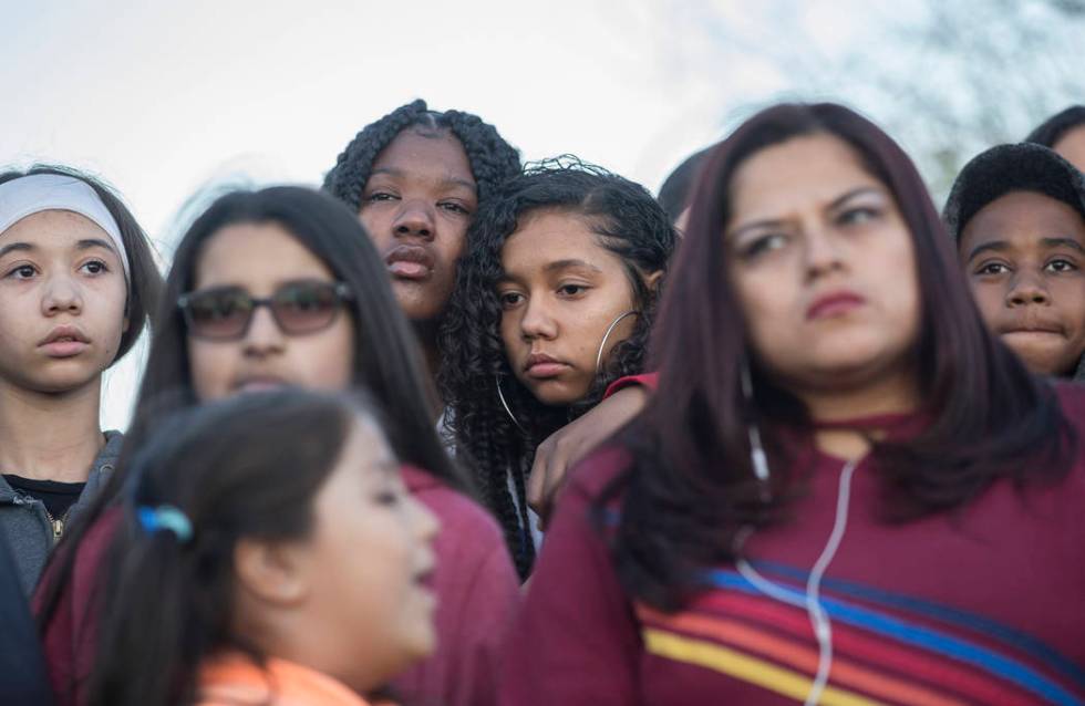 Friends and family mourn the loss of Jonathan Smith, 12, during a vigil for Smith at Wilbur &am ...