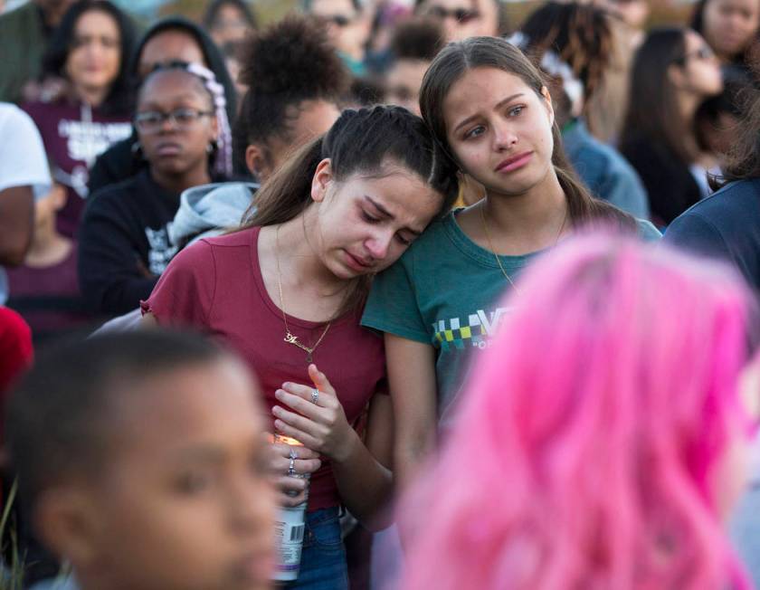 Friends and family mourn the loss of Jonathan Smith, 12, during a vigil for Smith at Wilbur &am ...