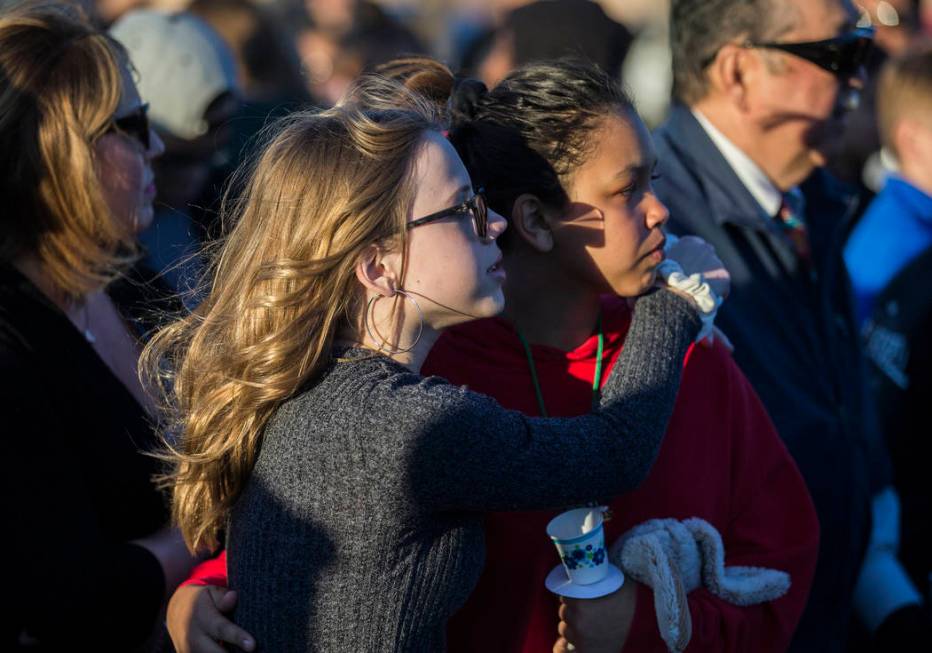 Friends and family mourn the loss of Jonathan Smith, 12, during a vigil for Smith at Wilbur &am ...