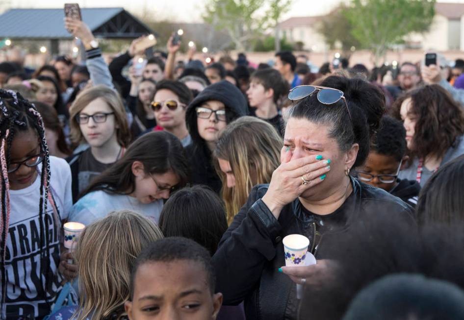 Friends and family mourn the loss of Jonathan Smith, 12, during a vigil for Smith at Wilbur &am ...