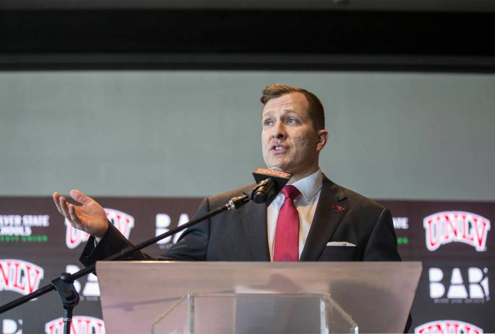 New UNLV men's basketball coach T.J. Otzelberger addresses the crowd at the Strip View Pavilion ...