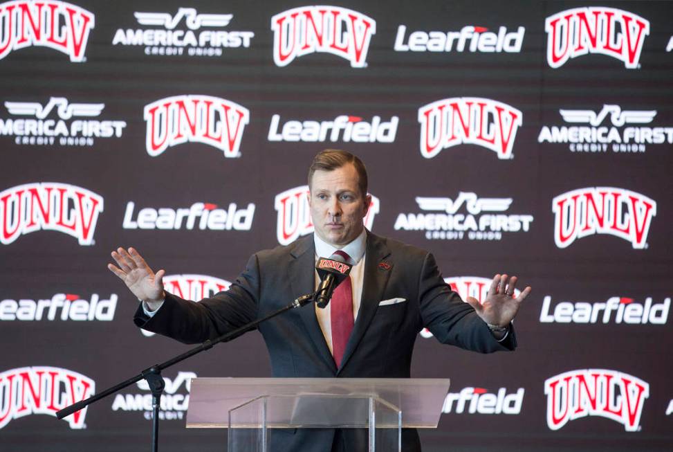 New UNLV men's basketball coach T.J. Otzelberger addresses the crowd at the Strip View Pavilion ...