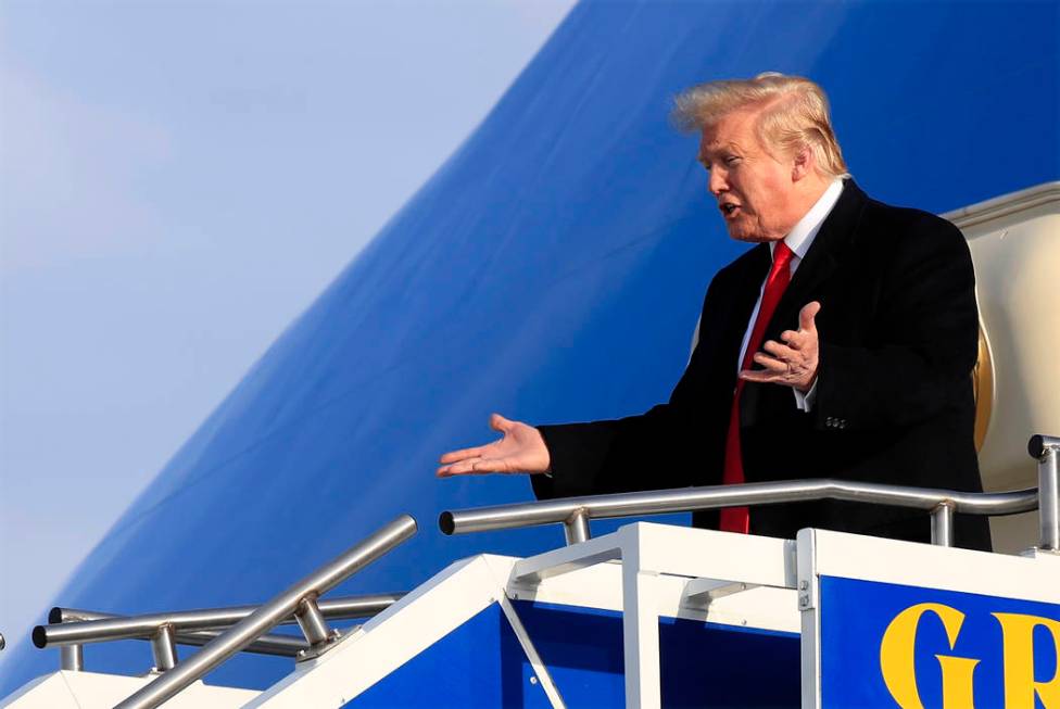 President Donald Trump arrives at Gerald R. Ford International Airport in Grand Rapids, Mich., ...