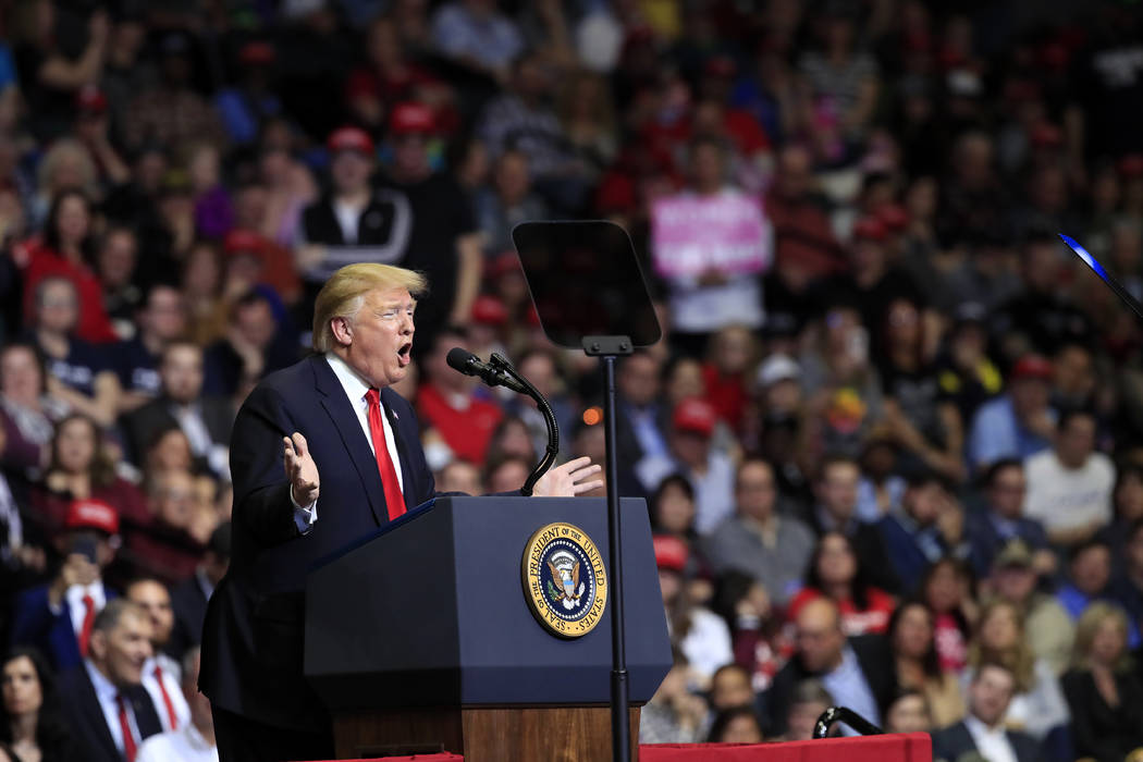 President Donald Trump speaks at a campaign rally in Grand Rapids, Mich., Thursday, March 28, 2 ...