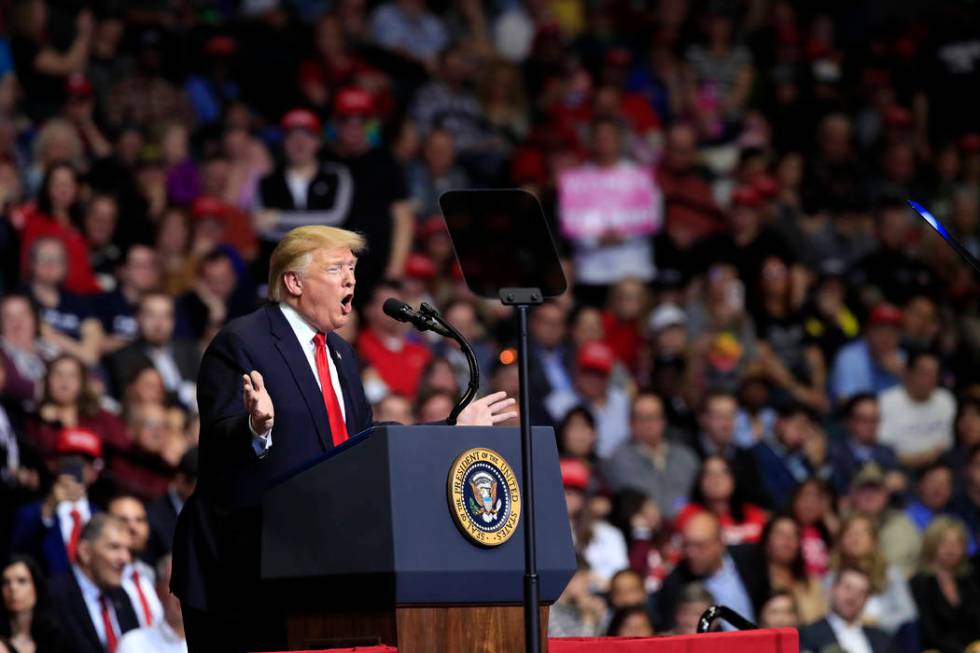 President Donald Trump speaks at a campaign rally in Grand Rapids, Mich., Thursday, March 28, 2 ...