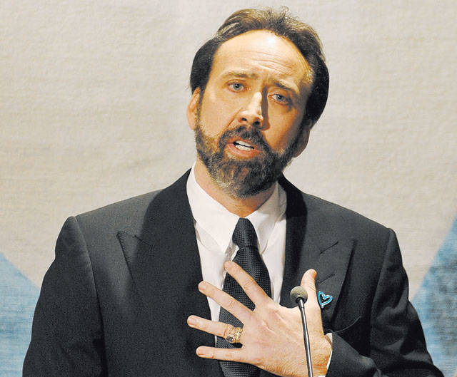 Nicolas Cage delivers a speech during a fund raising event for the United Nations Office on Dru ...