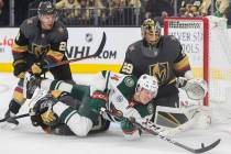 Golden Knights goaltender Marc-Andre Fleury (29) makes a save against Minnesota Wild center Joe ...