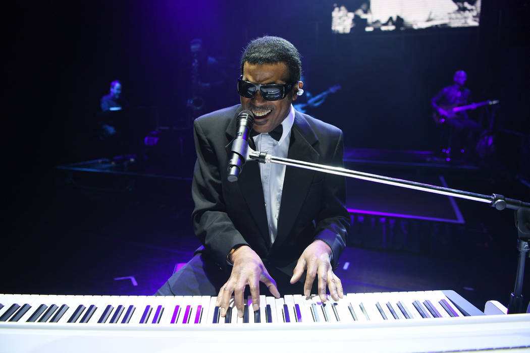 Pete Peterkin portrays Ray Charles in "The Greatest Piano Men" at Flamingo Las Vegas. (Denise T ...