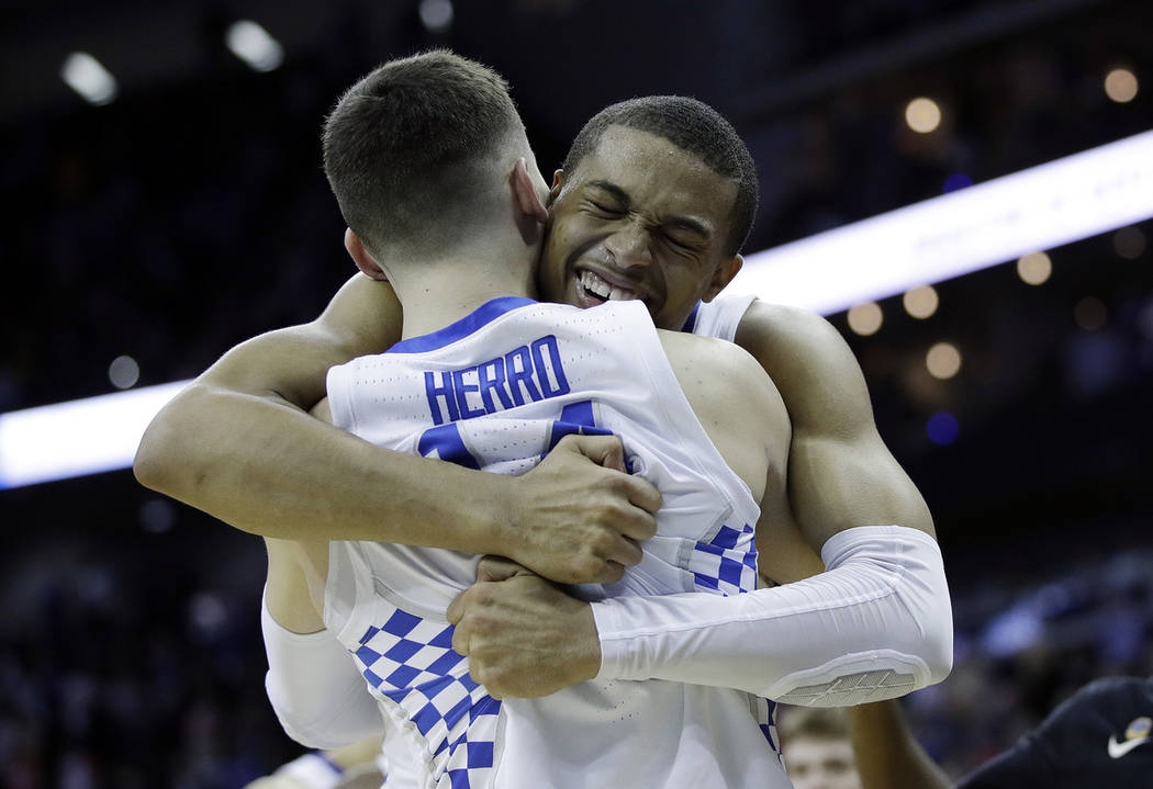 Kentucky's PJ Washington celebrates with teammate Tyler Herro near the end of a men's NCAA tour ...