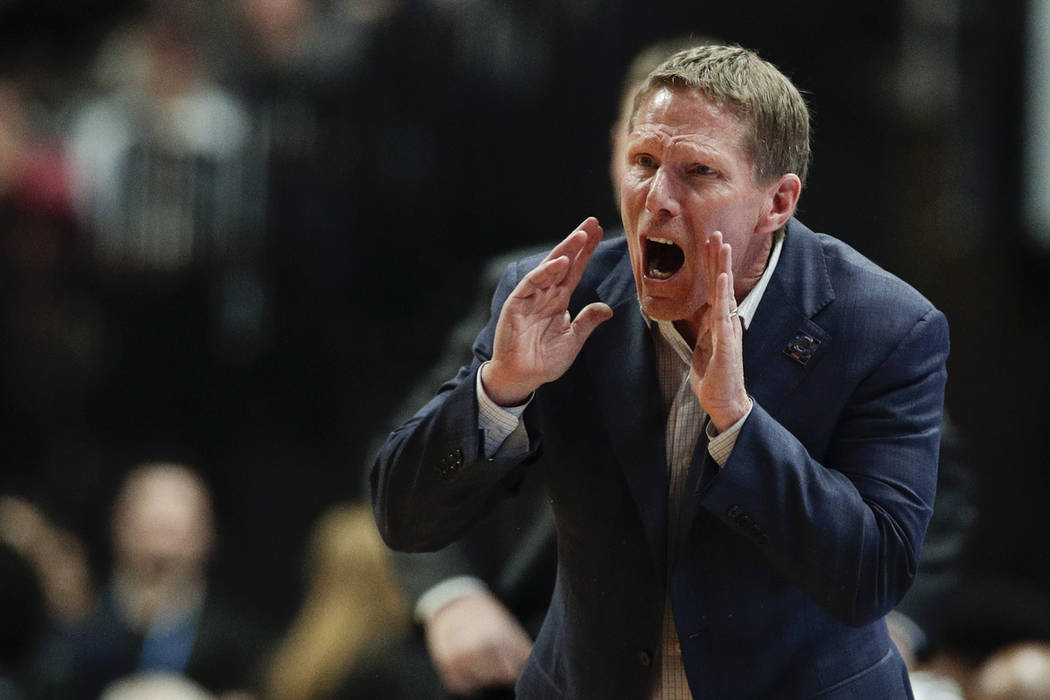 Gonzaga coach Mark Few shouts during the second half of the team's West Regional final against ...