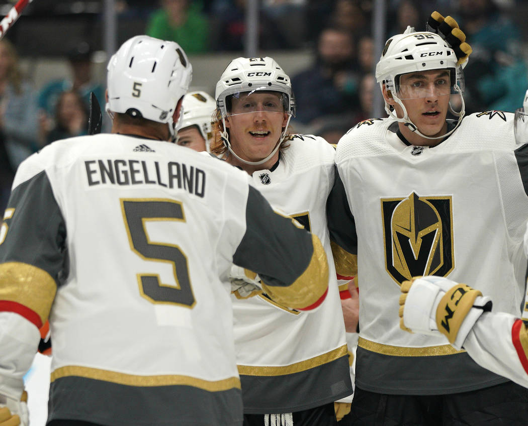 Vegas Golden Knights center Cody Eakin, center, celebrates his goal against the San Jose Sharks ...