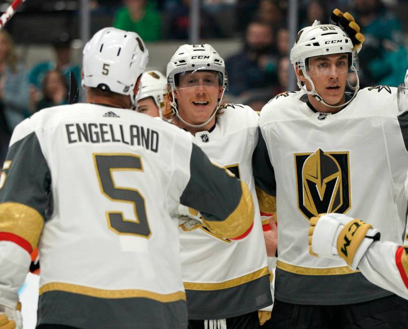 Vegas Golden Knights center Cody Eakin, center, celebrates his goal against the San Jose Sharks ...