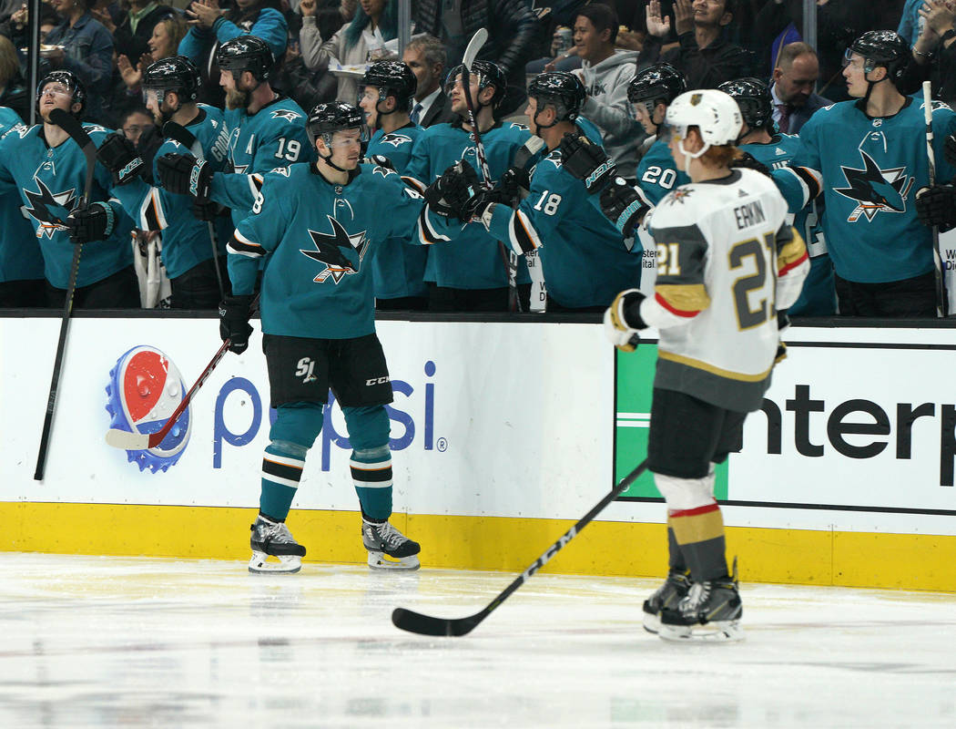 San Jose Sharks center Tomas Hertl, left, celebrates with teammates after scoring a goal agains ...