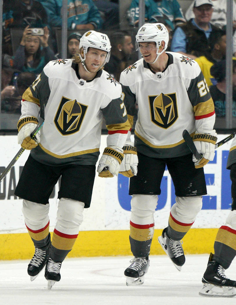 Vegas Golden Knights center William Karlsson (71) is congratulated by teammate Nick Holden (22) ...