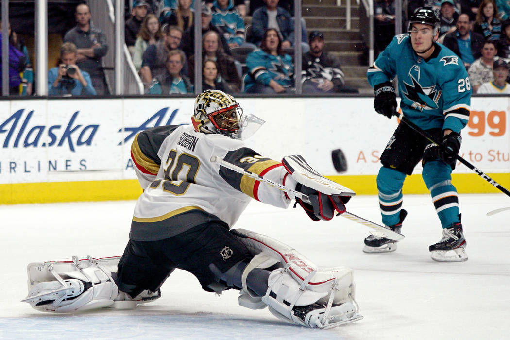 Vegas Golden Knights goaltender Malcolm Subban (30) blocks a shot by San Jose Sharks right wing ...